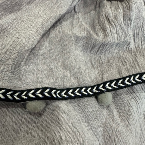 Women’s Gray Flowy Crop Top with Pom Poms - Picture 2 of 3